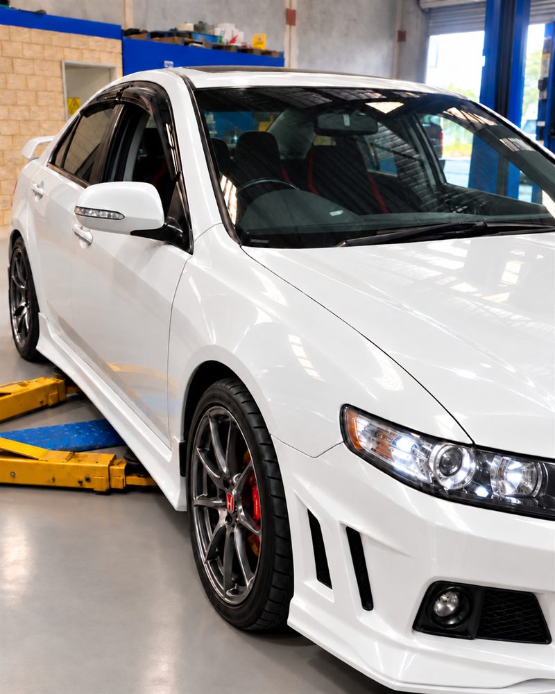 Honda Accord Euro R side view on hoist arms