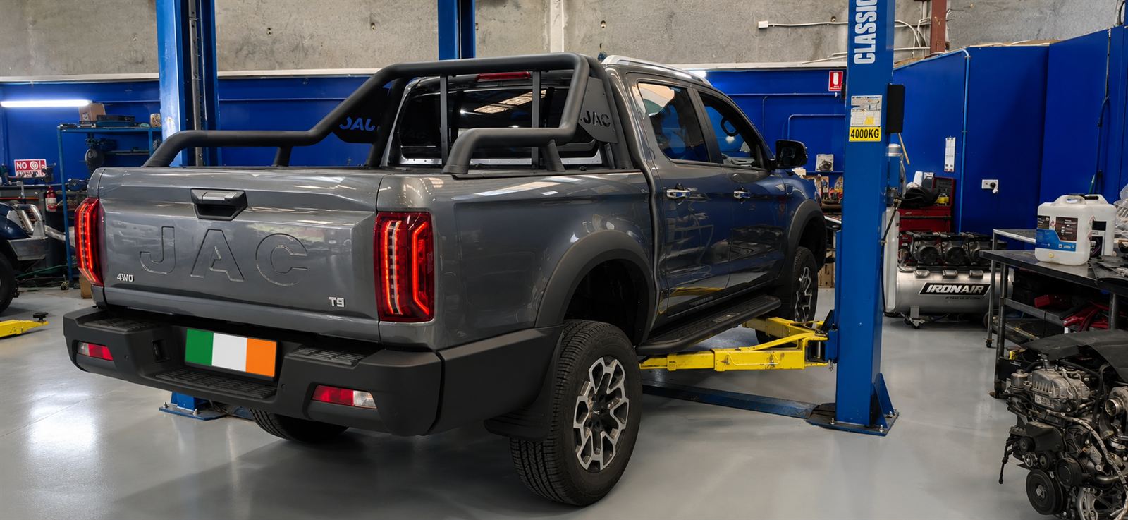 Grey JAC T9 dual-cab with a black sports bar on the hoist