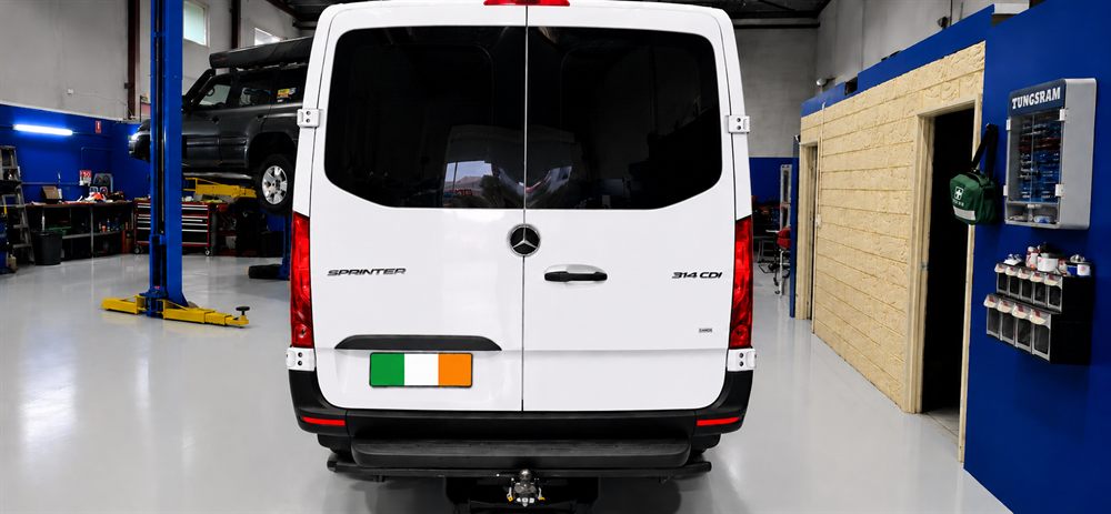 Rear of a white Mercedes-Benz Sprinter van