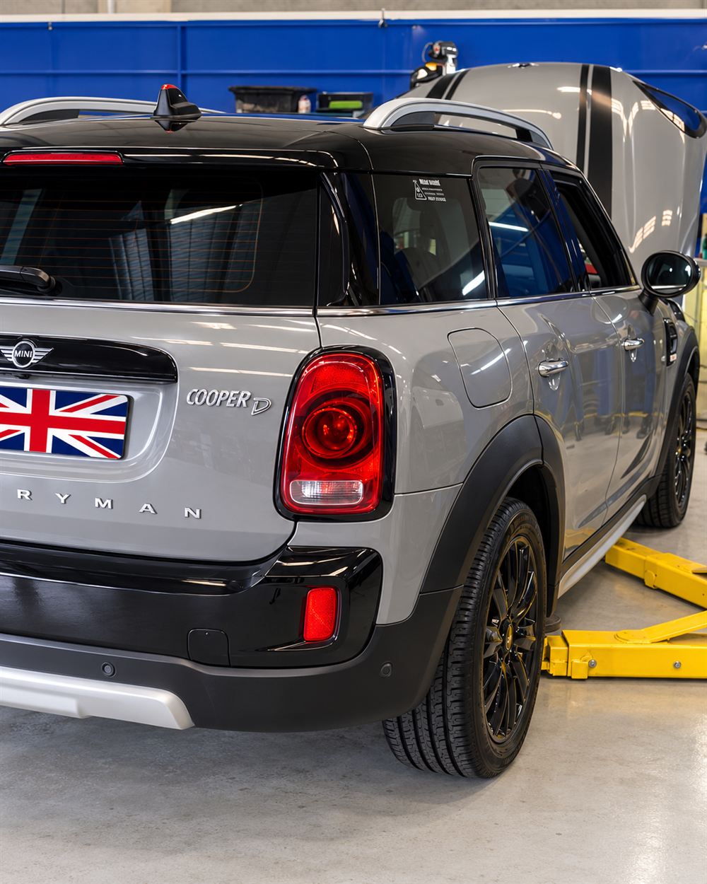 Rear three-quarter view of a MINI Countryman on the hoist
