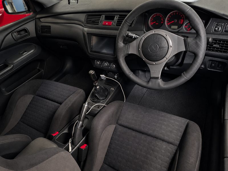 Mitsubishi Lancer Evolution interior with manual shifter
