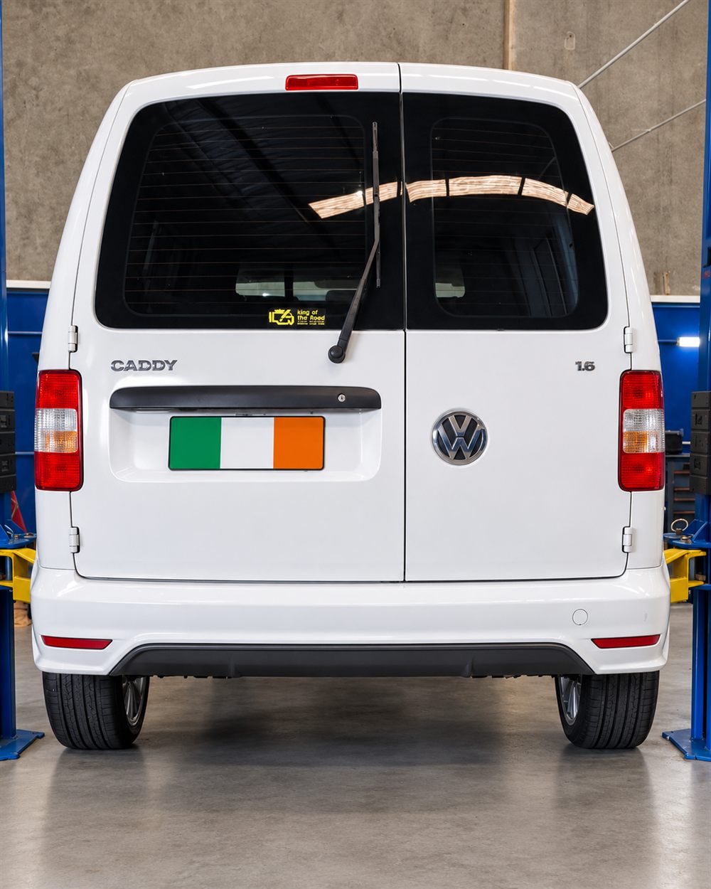 Rear of a white Volkswagen Caddy van