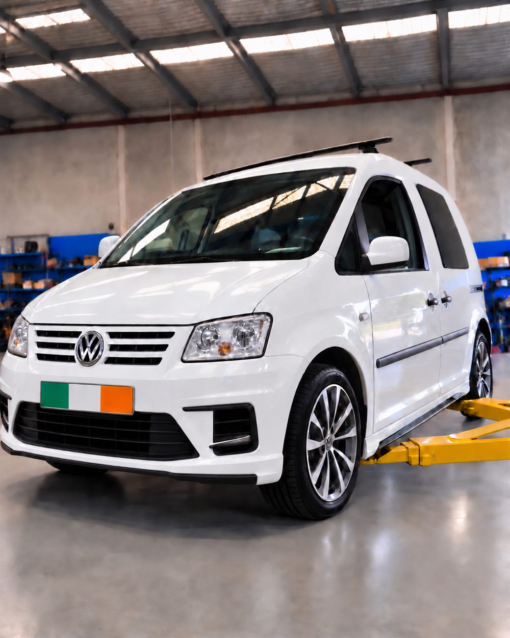 White Volkswagen Caddy front three-quarter view