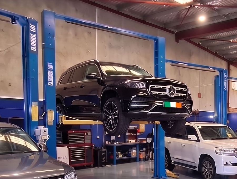 Black Mercedes-Benz GLS raised on a two-post hoist