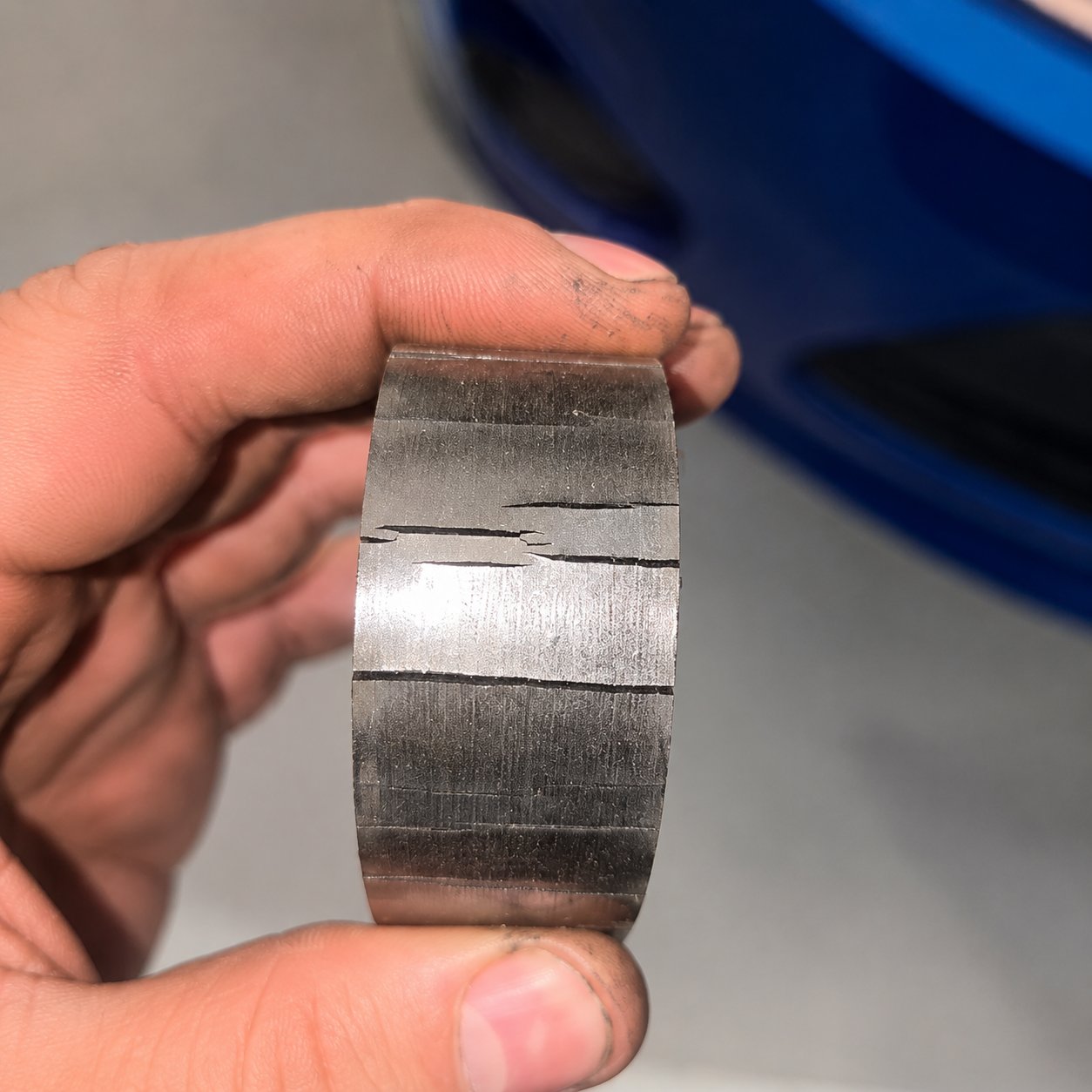 Back of an old timing belt cracked right across